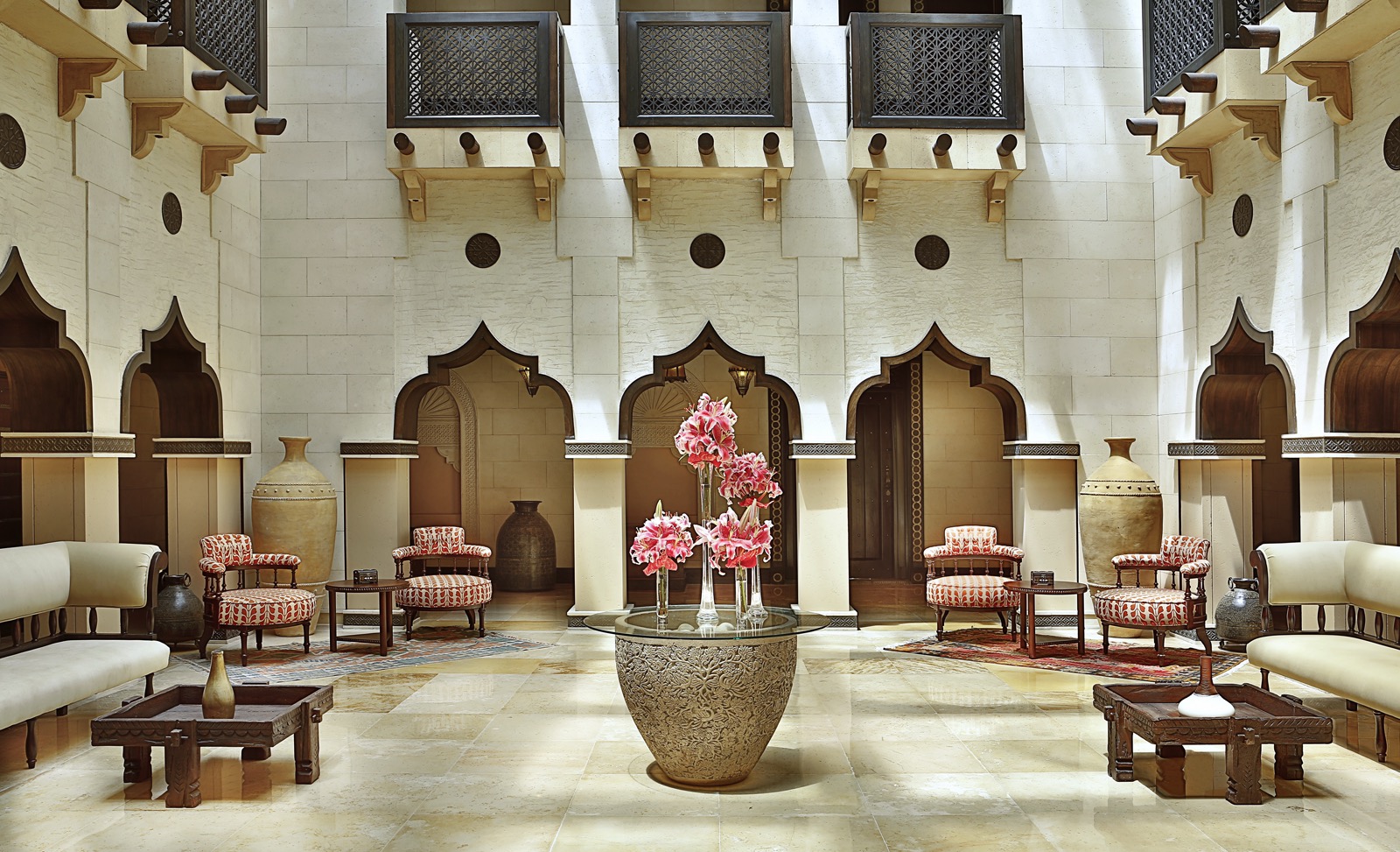 A quiet Qatari atrium arranged for conversation